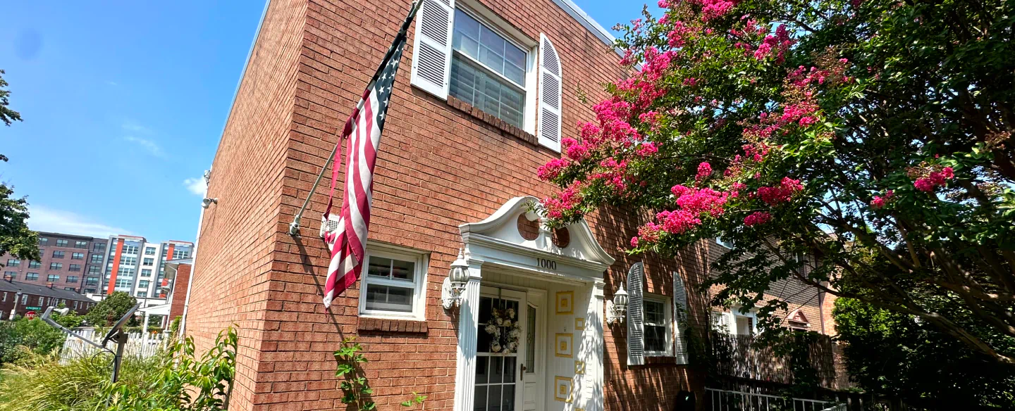 residential house with a flag on the wall